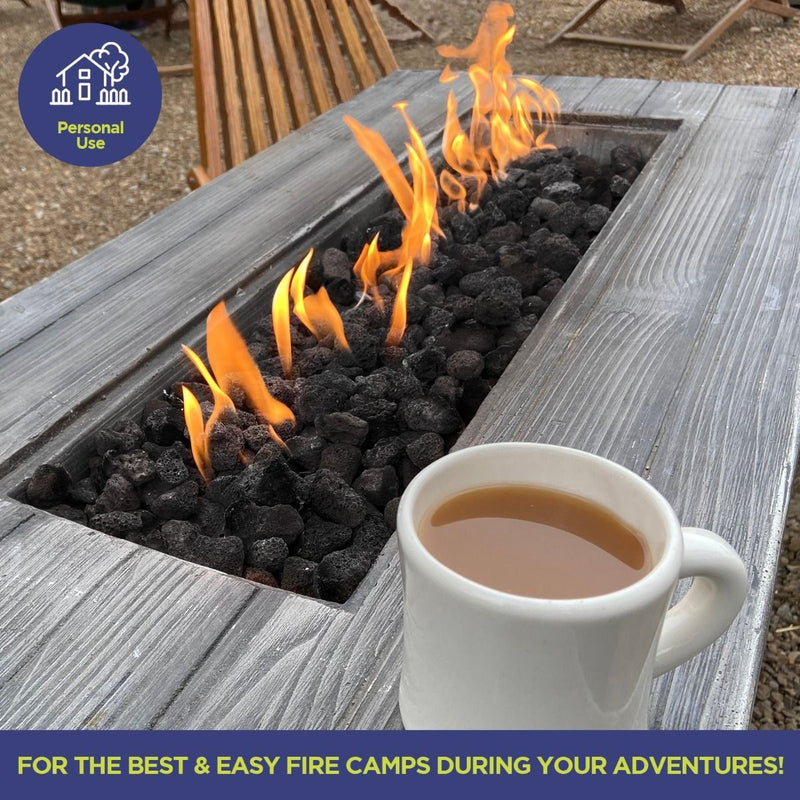 Load image into Gallery viewer, Natural volcanic lava rocks used as a base and decorative layer in an outdoor fire pit, enhancing heat distribution and aesthetics
