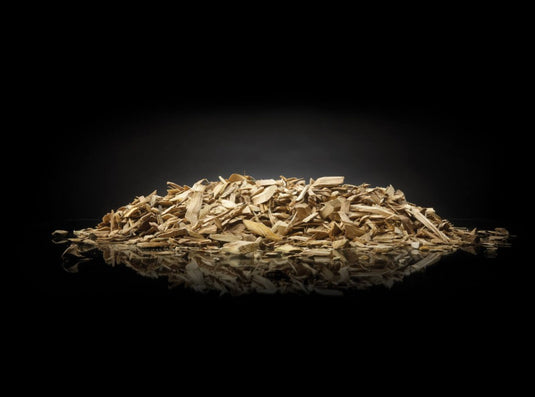 Napoleon 67007 natural apple wood chips for BBQ smoking displayed on a reflective black background