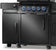 Load image into Gallery viewer, Close-up of Napoleon 68006 matte black storage cabinet installed beside a Phantom Rogue PRO-S grill with illuminated control knobs
