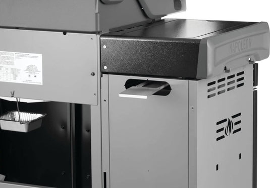 Rear detail of Napoleon 68009 Rogue PRO storage cart installation showing clearance for the grill grease tray access