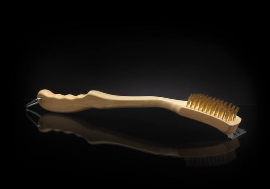 Napoleon Brass Grill Brush with hardwood handle and metal scraper for cleaning porcelain-coated cast iron cooking grids