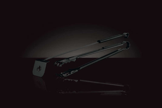 Napoleon charcoal rake and tongs set made of stainless steel for safe handling of hot coals and grilling grids