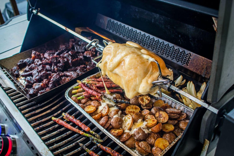 Load image into Gallery viewer, Napoleon Commercial Quality Rotisserie Forks – Set of two stainless steel forks with four prongs for secure meat placement on rotisserie spit rods.
