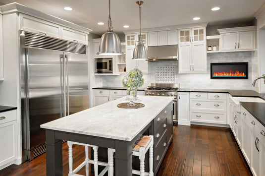 Napoleon Entice 36-inch electric fireplace installed on the wall of a modern white kitchen
