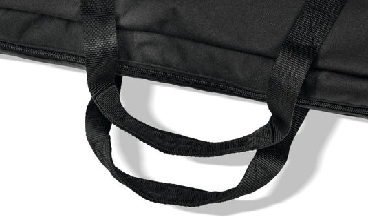 Close-up of reinforced fabric carrying handles on a Napoleon griddle insert storage bag