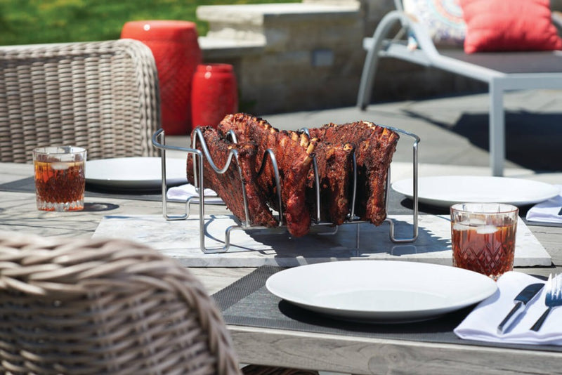 Load image into Gallery viewer, Napoleon Meat Lover’s Starter Kit with stainless steel rib rack, double beer can chicken roaster, skewers, and button thermometers for grilling

