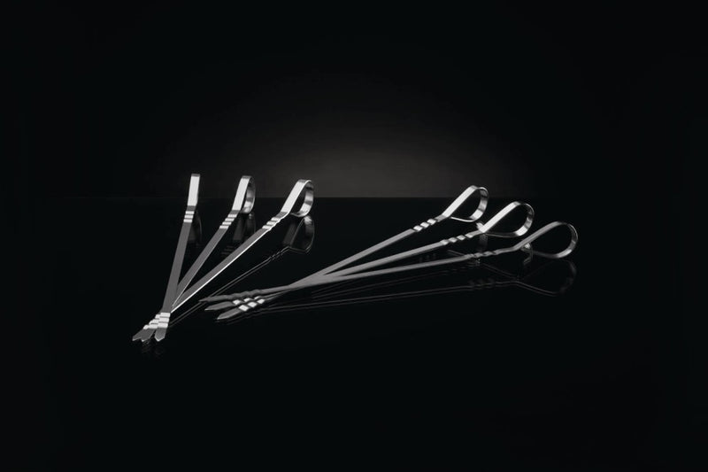 Load image into Gallery viewer, Napoleon Meat Lover’s Starter Kit with stainless steel rib rack, double beer can chicken roaster, skewers, and button thermometers for grilling
