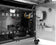 Load image into Gallery viewer, Open Napoleon Prestige PRO 500 cabinet with door-mounted rotisserie motor and forks
