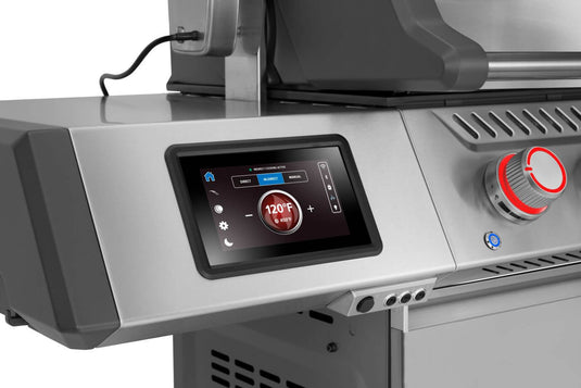 Close-up of Napoleon Prestige PRO 500 LCD showing indirect cooking mode beside a red illuminated knob