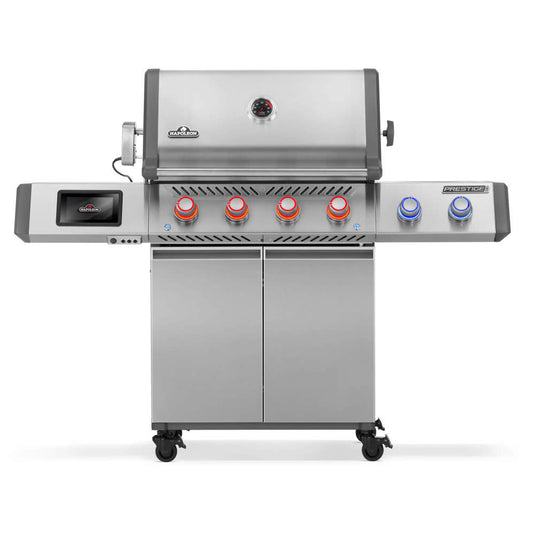 Front view of Napoleon Prestige PRO 500 stainless steel grill with red and blue illuminated knobs
