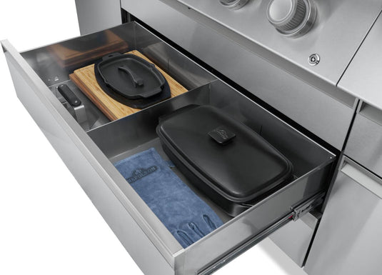 Napoleon Prestige PRO 665 Elite organized storage drawer holding cookware, utensils, and a towel