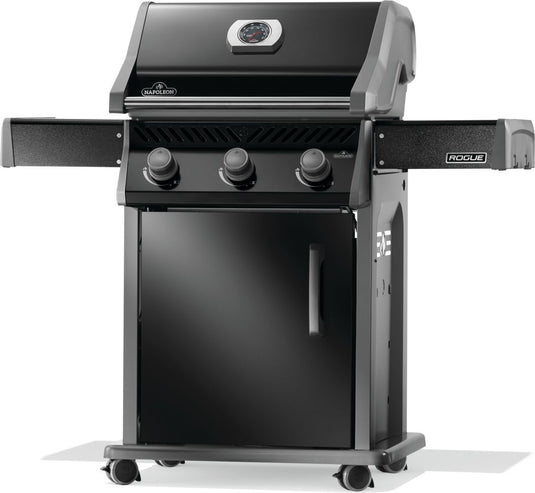 Napoleon Rogue 425 black 3-burner gas grill with extended side shelves, shown from an angled front view