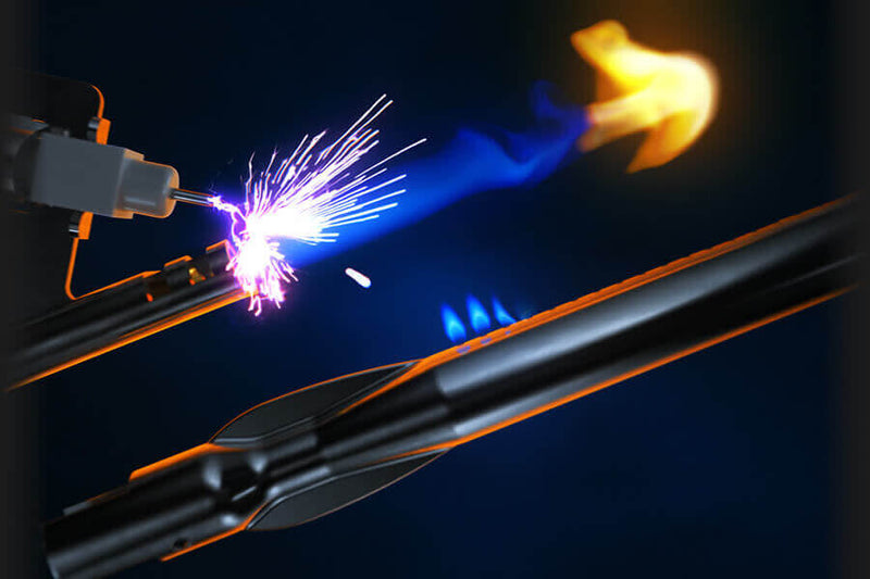 Load image into Gallery viewer, Welding process with sparks and flame on a dark background
