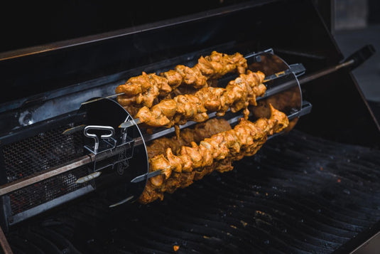 Napoleon Rotisserie Shish Kebab Skewer Set with 6 chrome skewers and 2 rotisserie plates