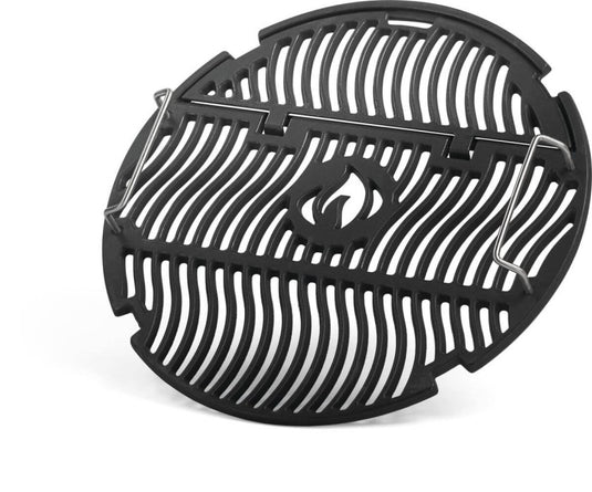 Angled view of Napoleon S83047 cast iron cooking grids showing the raised center section and metal lifting handles