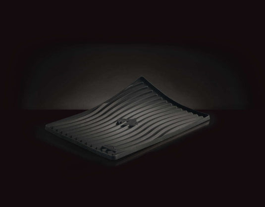 Heat resistant silicone protective mat with Napoleon WAVE™ pattern on grill side shelf