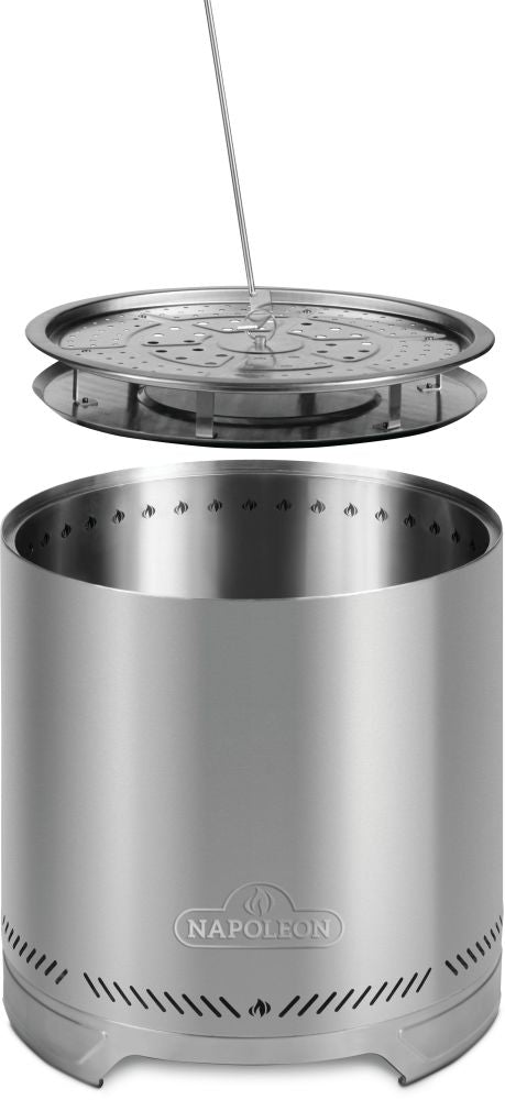 Napoleon Timberwolf 18-inch stainless steel smokeless fire pit (NWFPMTI-SS), showing the removable ash pan being lifted out with a poker for easy cleaning.