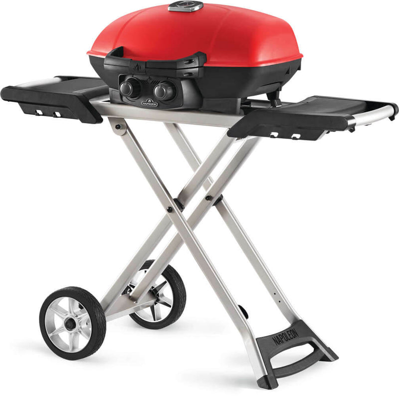 Load image into Gallery viewer, Napoleon TravelQ 285X red portable propane gas grill with scissor cart and reversible cast iron griddle, featuring 2 burners for versatile outdoor cooking

