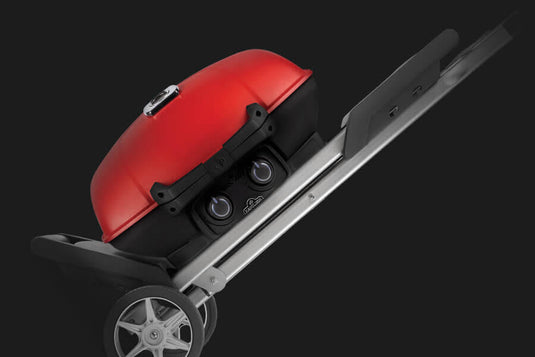 Napoleon TravelQ 285X red portable propane gas grill with scissor cart and reversible cast iron griddle, featuring 2 burners for versatile outdoor cooking