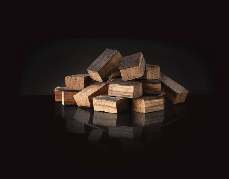 Load image into Gallery viewer, Napoleon Whiskey Barrel Oak Wood Chunks for smoking meat, fish, and vegetables on charcoal grills
