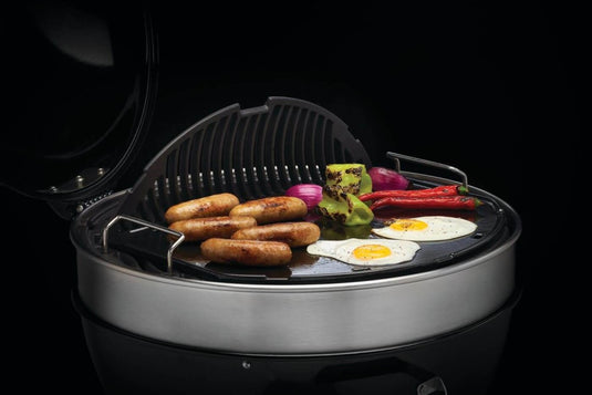 Napoleon cast iron reversible griddle for 22-inch charcoal kettle grill, showing flat and raised grilling surfaces