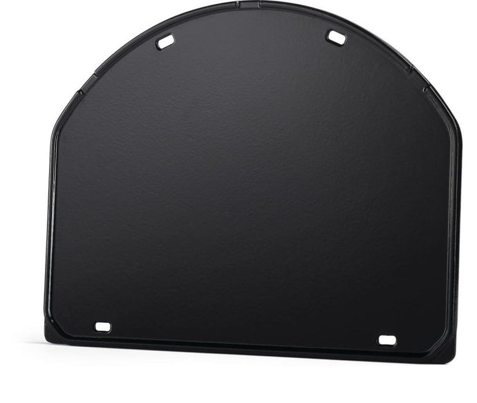 Napoleon cast iron reversible griddle for 22-inch charcoal kettle grill, showing flat and raised grilling surfaces