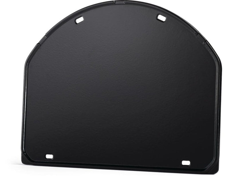 Load image into Gallery viewer, Napoleon cast iron reversible griddle for 22-inch charcoal kettle grill, showing flat and raised grilling surfaces
