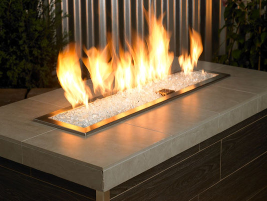 Outdoor fire pit filled with 1/2 inch StarFire Fire Glass producing bright flames and sparkling decorative appeal