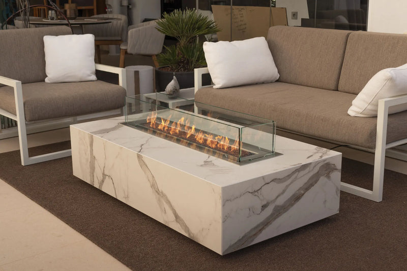 Load image into Gallery viewer, Planika Cabo Fire Table Daze installed on a luxury outdoor patio with decorative flames
