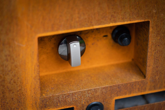 Close-up of Planika Galio Corten Manual outdoor gas fireplace