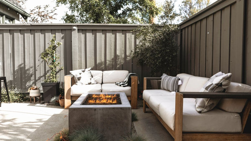 Load image into Gallery viewer, Planika Galio H Insert Automatic outdoor gas burner on a luxury patio at night
