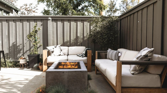 Planika Galio H Insert Automatic outdoor gas burner on a luxury patio at night