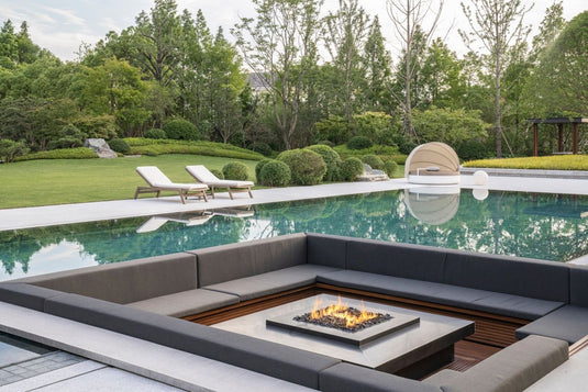 Planika Galio H Insert Automatic outdoor gas burner on a luxury patio at night