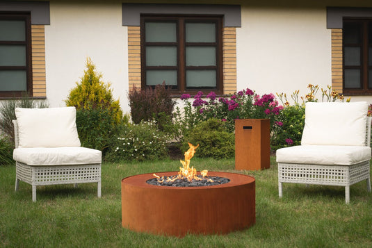 Planika Galio Star Corten outdoor gas fireplace installed on luxury patio with multidimensional flames
