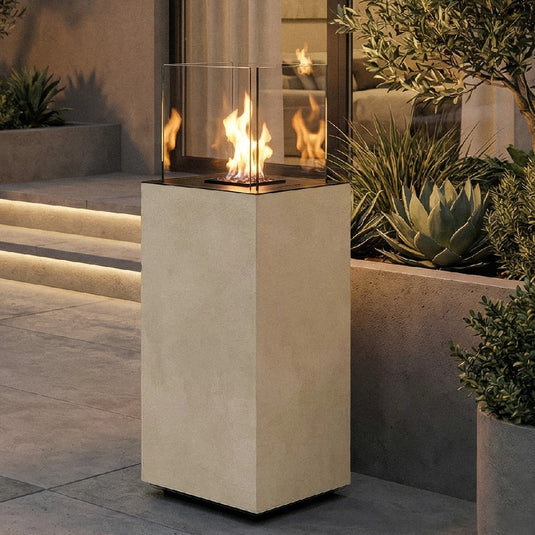 Planika Porto Nacre freestanding fireplace used in a modern outdoor lounge area