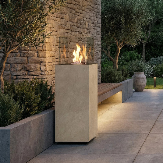 Planika Porto Nacre freestanding fireplace used in a modern outdoor lounge area