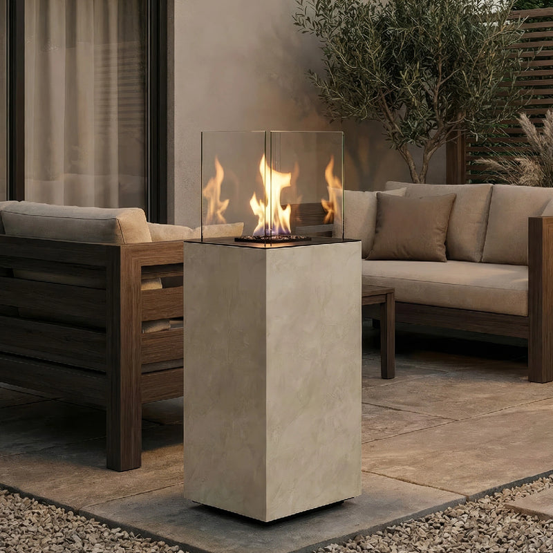 Load image into Gallery viewer, Planika Porto Nacre freestanding fireplace used in a modern outdoor lounge area
