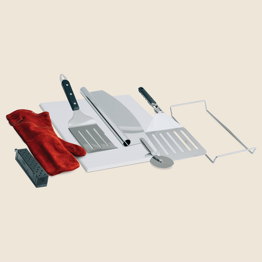 Summerset 8-Piece Pizza Oven Accessory Kit with pizza stone, grill rack, spatulas, cutters, paddle, glove, and smoker box